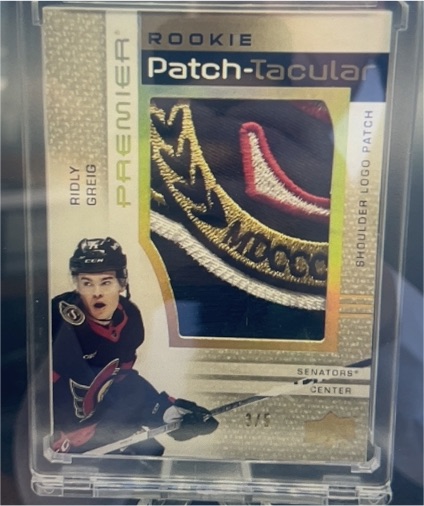 2023-24 Upper Deck Premier Rookie Patch-Tacular #Ridly Greig — front