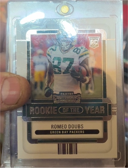 2022 Panini Contenders Rookie of the Year #ROY-RDO Romeo Doubs — front