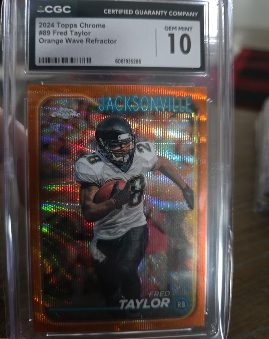 2024 Topps Chrome #89 Fred Taylor Orange Wave Refractor — front