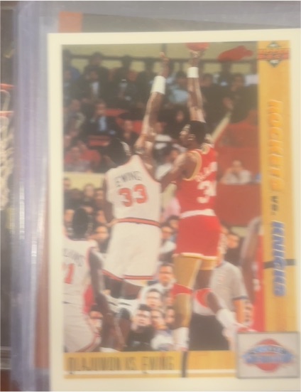 1991-92 Upper Deck #33 Hakeem Olajuwon vs. Patrick Ewing — front