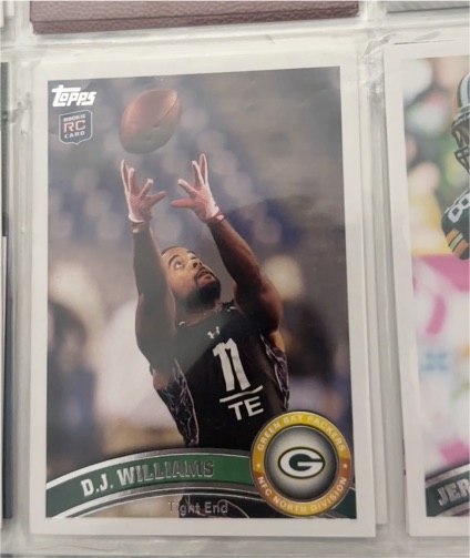 2011 Topps #409 D.J. Williams — front