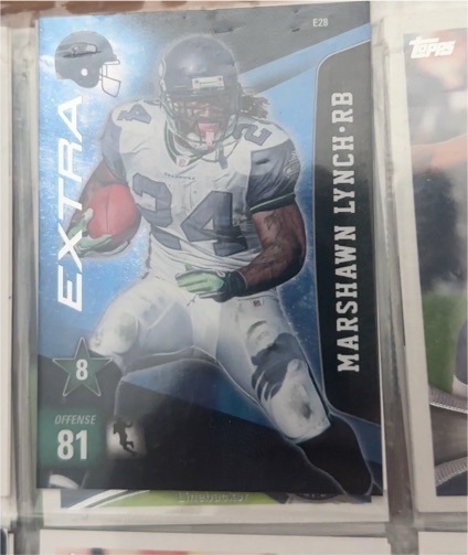2011 Panini Adrenalyn XL #E28 Marshawn Lynch — front