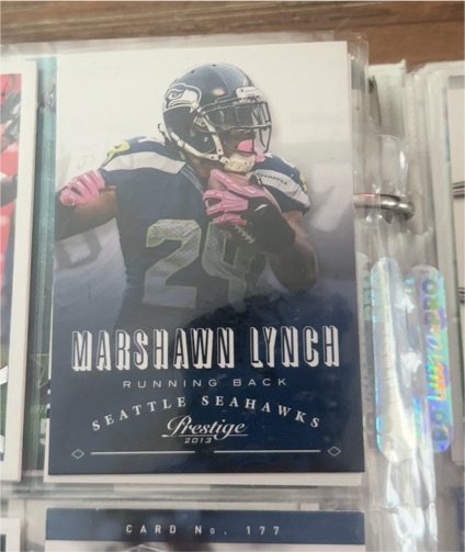 2013 Panini Prestige #179 Marshawn Lynch — front
