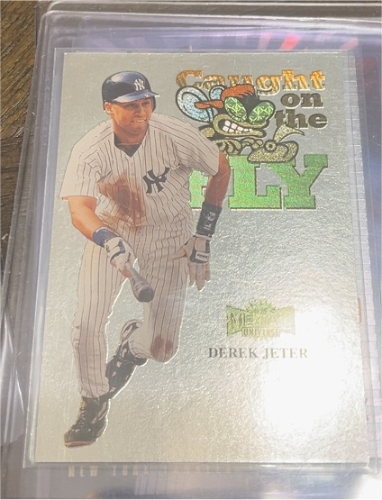 1999 Skybox Metal Universe #238 Derek Jeter Caught on the Fly — front