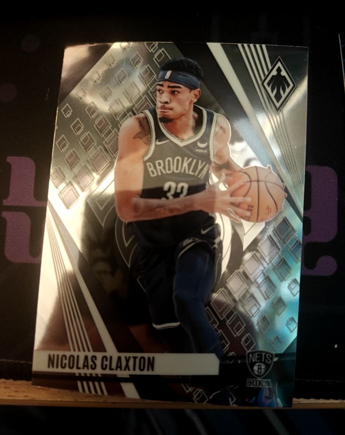 2023-24 Panini Phoenix #219 Nicolas Claxton — front