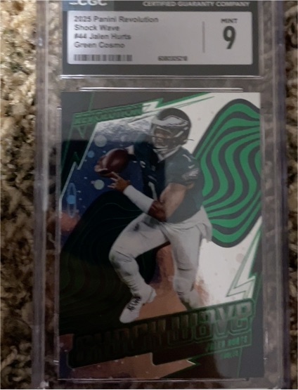 2025 Panini Revolution #44 Jalen Hurts Shock Wave Green Cosmo — front