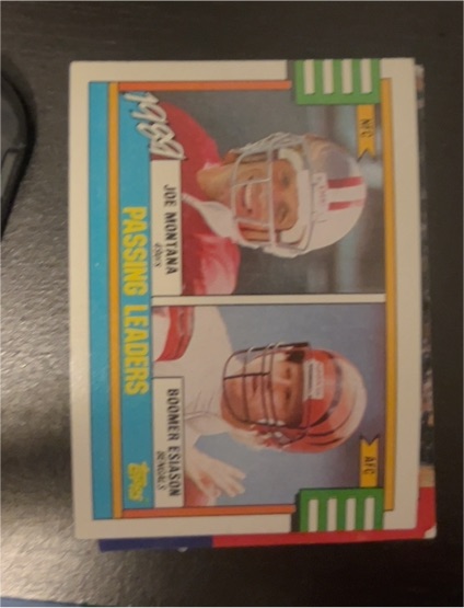 1990 Topps #229 1989 Passing Leaders Joe Montana & Boomer Esiason — front
