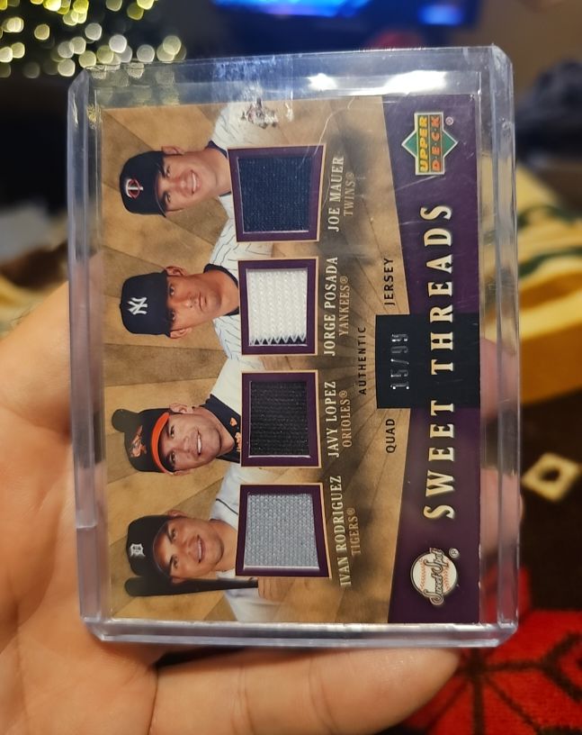 2004 Upper Deck Sweet Spot Sweet Threads Quad Jersey #157 Jorge Posada Joe Mauer Javy Lopez Ivan Rodriguez — front