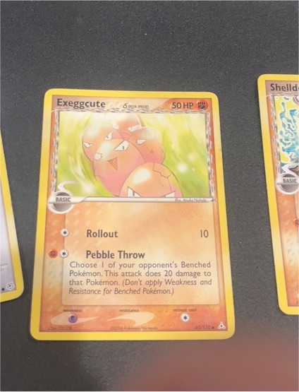 2006 EX Holon Phantoms #65 Exeggcute — front