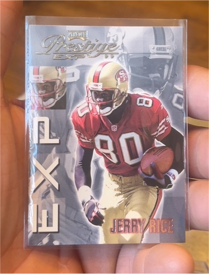 1999 Playoff Prestige EXP #EX89 Jerry Rice — front
