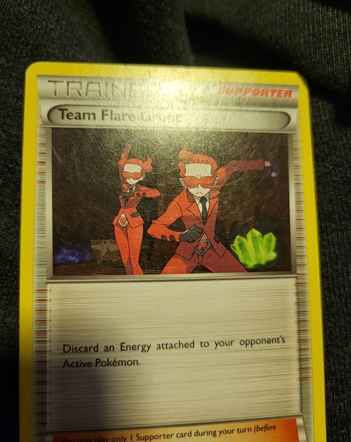2014 Pokémon XY Base Set #129 Team Flare Grunt — front