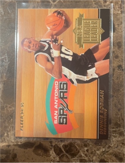 1994-95 Fleer NBA League Leaders #7 Dennis Rodman — front