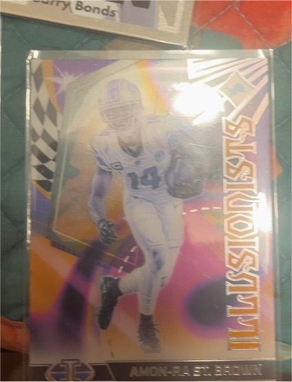 2023 Panini Illusions #1 Amon-Ra St. Brown Illusionists — front
