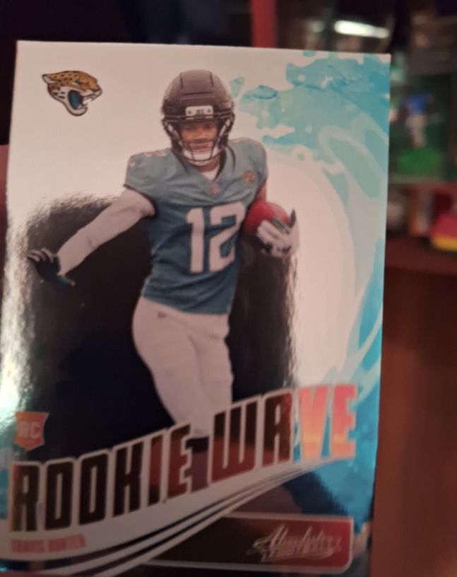 2025 Panini Absolute Rookie Wave #RW-THR Travis Hunter — front