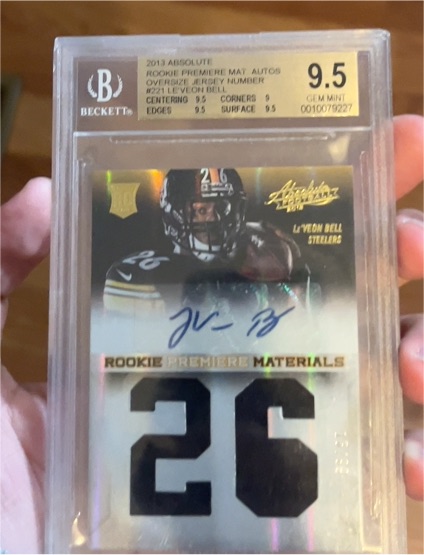 2013 Panini Absolute Rookie Premiere Materials #RPM Le'Veon Bell — front