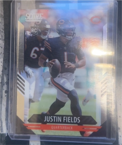 2021 Panini Chronicles Score Update Rookies #403 Justin Fields — front