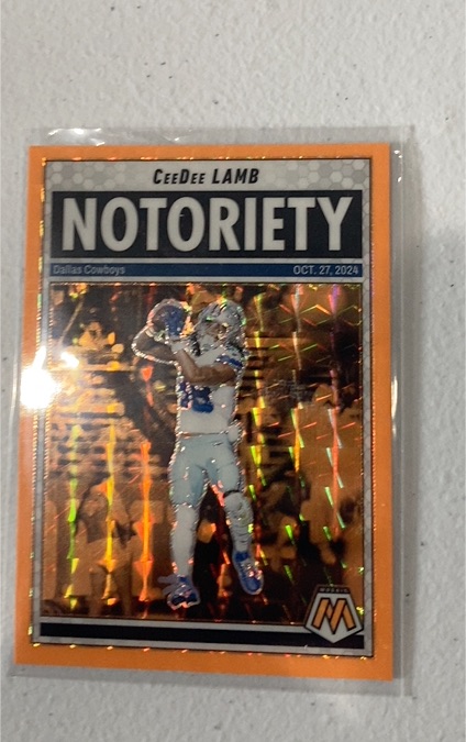 2025 Panini Mosaic #8 CeeDee Lamb Notoriety Orange Fluorescent — front