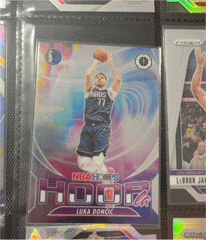 2023-24 Panini NBA Hoops Premium Stock Hoopla #7 Luka Doncic — front