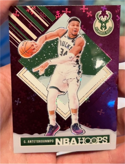 2024-25 Panini NBA Hoops #285 Giannis Antetokounmpo Purple Tribute Winter Prizm — front