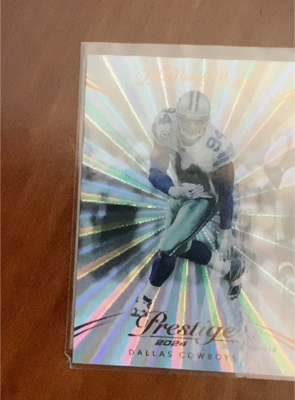 2024 Panini Prestige DeMarcus Ware Xtra Points Sunburst Dallas Cowboys — front