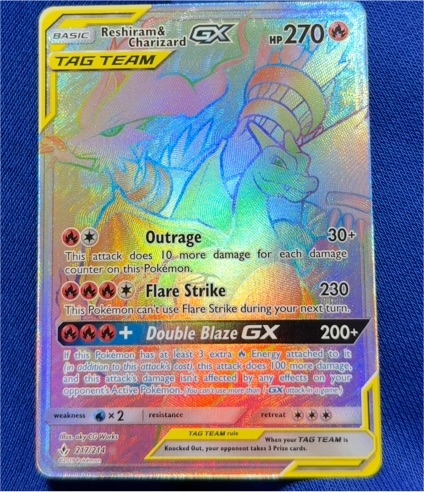 2019 Pokémon SM Unbroken Bonds #SM247 Reshiram & Charizard GX — front