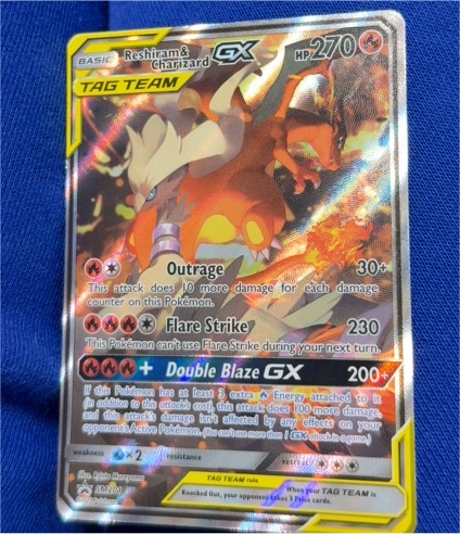 Pokémon Sun & Moon #SM201 Reshiram & Charizard GX Tag Team — front