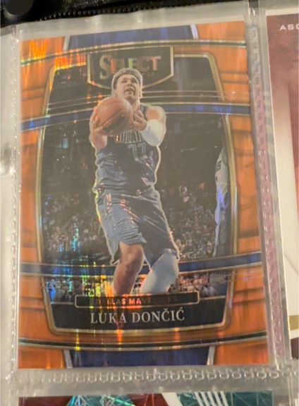 2021-22 Panini Select Concourse Orange Flash Prizm #12 Luka Dončić — front