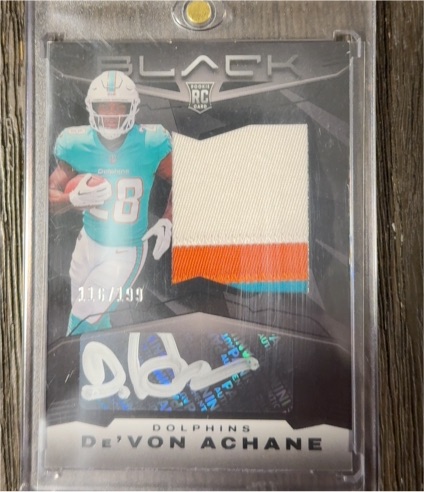 2023 Panini Black #201 De'Von Achane Rookie Patch Autograph — front