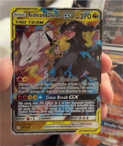 2019 Pokémon TCG Cosmic Eclipse #157 Reshiram & Zekrom GX — front