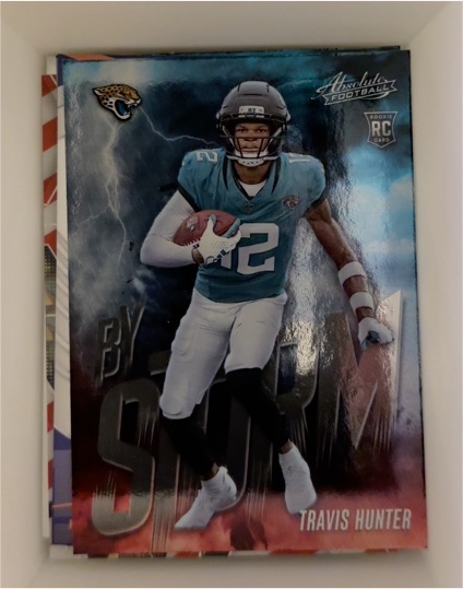 2025 Panini Absolute By Storm #17 Travis Hunter — front