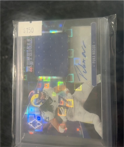 2023 Panini Unparalleled Puka Nacua Rookie Patch Auto — front