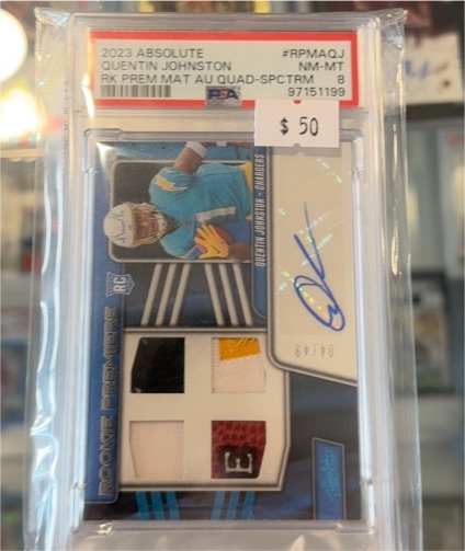2023 Panini Absolute #RPMAQJ Quentin Johnston Rookie Premiere Material Quad Patch Auto #69/99 — front