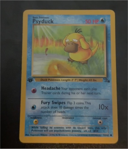 1999 Pokémon Fossil #53 Psyduck — front