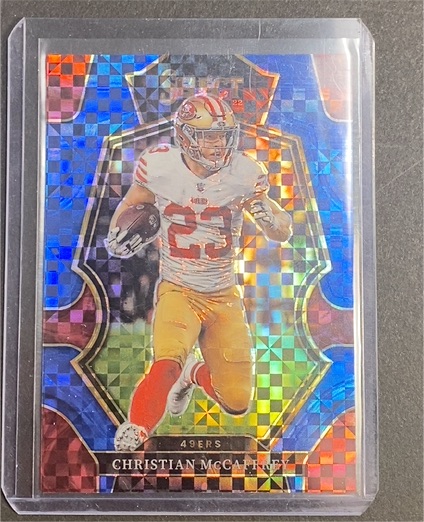 2022 Panini Select Premier Level Christian McCaffrey — front