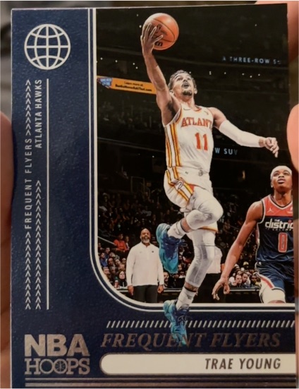 2024-25 Panini NBA Hoops #12 Trae Young Frequent Flyers — front