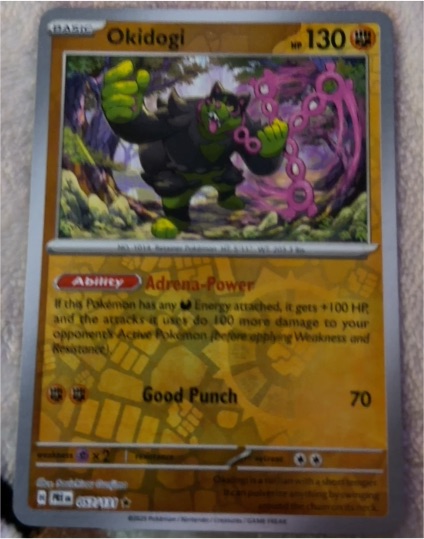 2023 Pokémon TCG Prismatic Evolutions #057 Okidogi — front