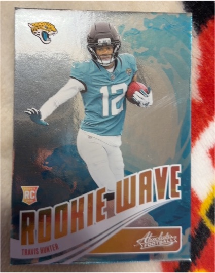 2025 Panini Absolute #RW-THR Travis Hunter Rookie Wave — front