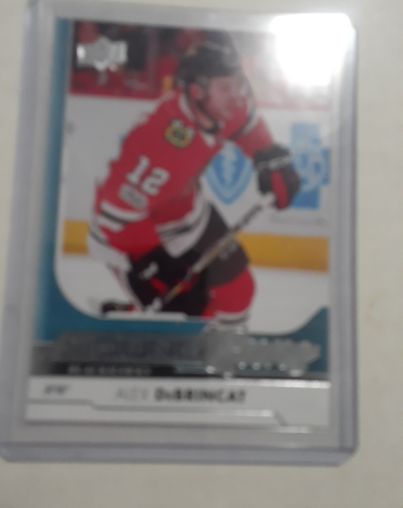 2017-18 Upper Deck #221 Alex DeBrincat Young Guns — front