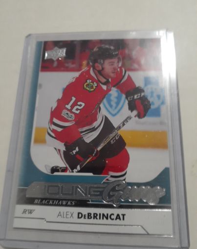 2017-18 Upper Deck Series 1 #221 Alex DeBrincat Young Guns Rookie RC — front
