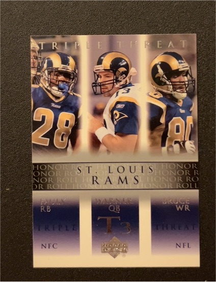 2002 Upper Deck Honor Roll #87 Marshall Faulk / Kurt Warner / Isaac Bruce Rams — front