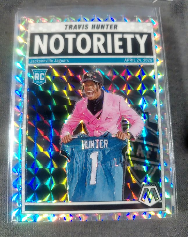 2025 Panini Mosaic #12 Travis Hunter Notoriety — front