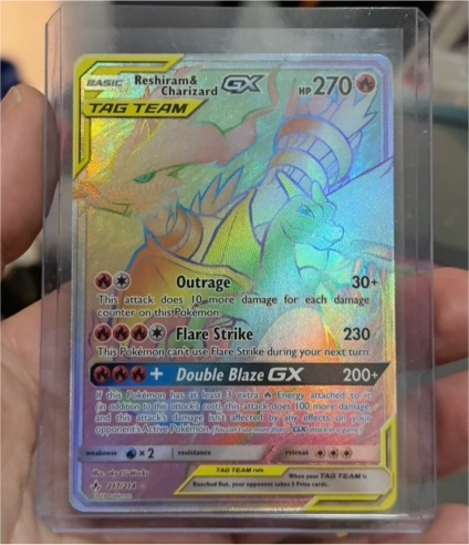 2019 Pokémon Sun & Moon Unbroken Bonds #217 Reshiram & Charizard GX — front