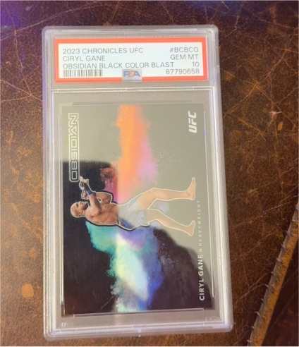 2023 Panini Chronicles UFC #BCBCG Ciryl Gane Obsidian Black Color Blast — front
