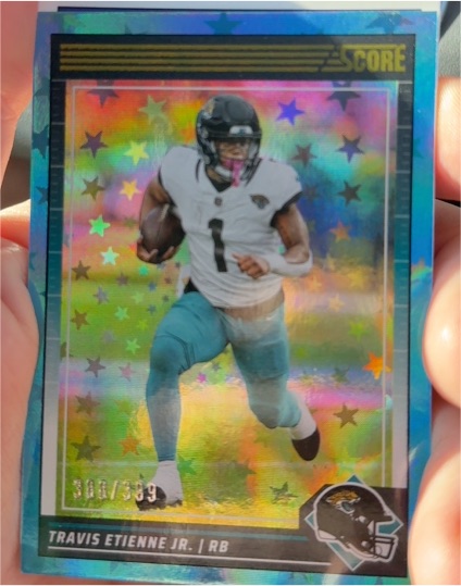 2024 Score #301 Travis Etienne Jr. Stars Blue Parallel — front