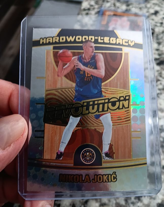 2024-25 Panini Revolution #7 Nikola Jokić Hardwood Legacy — front