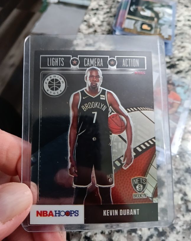 2019-20 Panini NBA Hoops Premium Stock #1 Kevin Durant Lights Camera Action — front