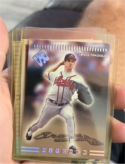1999 Pacific Private Stock #11 Greg Maddux — front