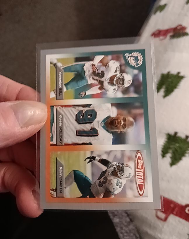 2005 Topps Total Football Terry Kirby Yancey Holiday Kevin Carter — front
