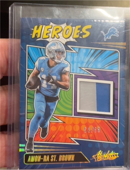 2025 Panini Absolute Heroes #AHM-ASB Amon-Ra St. Brown — front