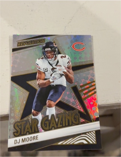 2025 Panini Revolution #4 D.J. Moore — front